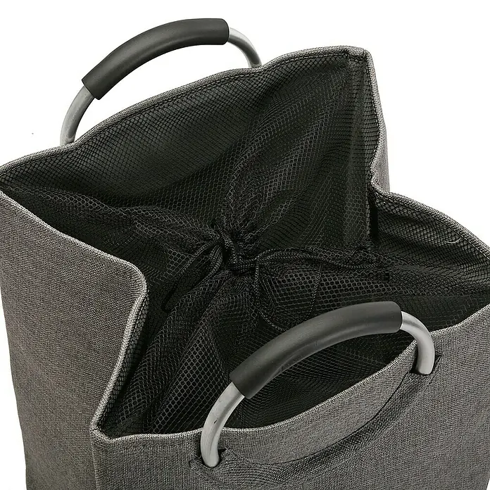 Versa Cesta para la ropa con asas - L x An x Al: 46 x 30 x 55 cm, Gris - Primer plano de una cesta de lavandería gris con un inserto de malla negra y asas de metal, ideal para guardar la ropa.