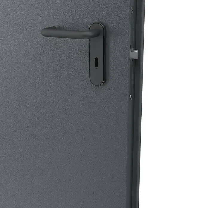 Padilla Brandschutztür Innova T30 Plus - 100 x 200 cm, Rechts, Anthrazitgrau - Nahaufnahme einer modernen, grauen Tür mit einem eleganten, schwarzen Türgriff und Schloss. Stilvolles Detail für ein sicheres Zuhause.