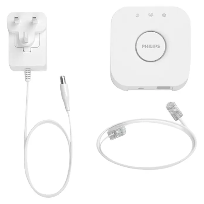 Philips Hue Steuerzentrale Bridge - Passend für: Philips Hue System, L x B x H: 2,6 x 8 x 8 cm - Das Bild zeigt ein Philips Hue Bridge Starter Set mit Netzteil, Kabel und der Bridge selbst. Das Set ermöglicht die Steuerung von Smart Home Beleuchtung.
