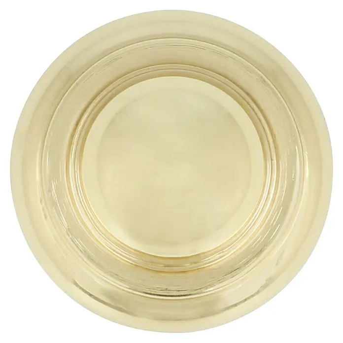 Häfele Pomo para muebles - Tipo de tirador del mueble: Botón, Ø x Al: 24 x 25 mm - Primer plano de un tarro dorado con una superficie lisa. El diseño minimalista y la sutil combinación de colores crean un efecto elegante.