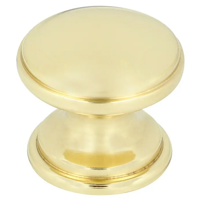 Häfele Pomo para muebles - Tipo de tirador del mueble: Botón, Ø x Al: 25 x 22 mm, Dorado - Primer plano de un tirador de mueble de latón pulido con un diseño redondeado y un acabado brillante.
