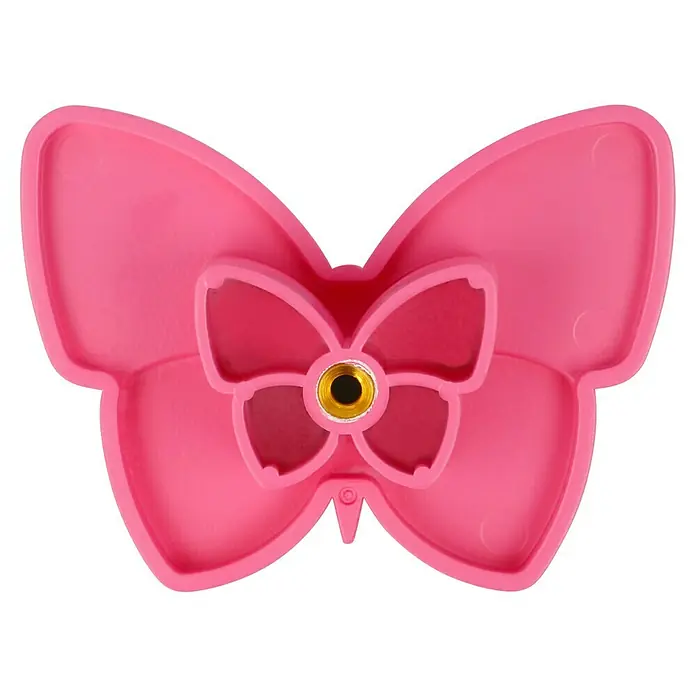 Häfele Pomo infantil para mueble - Botón, Ø x Al: 70 x 53 mm, Lila, Mariposa - Primer plano de una herramienta rosa en forma de mariposa con un centro dorado, utilizada para manualidades o decoraciones.