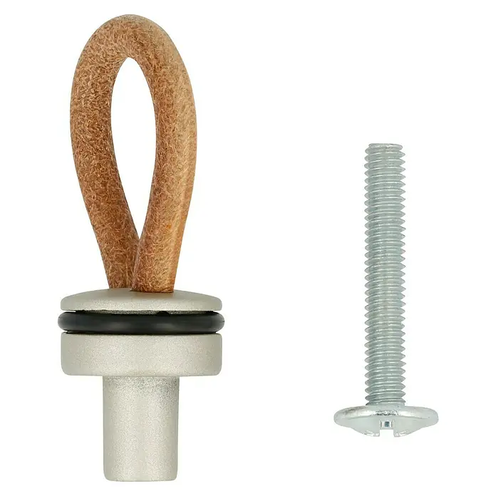 Häfele Tirador para muebles - Tipo de tirador del mueble: Botón, Piel - Primer plano de un pomo de mueble con lazo de cuero y un tornillo, ideal para realzar muebles con estilo.