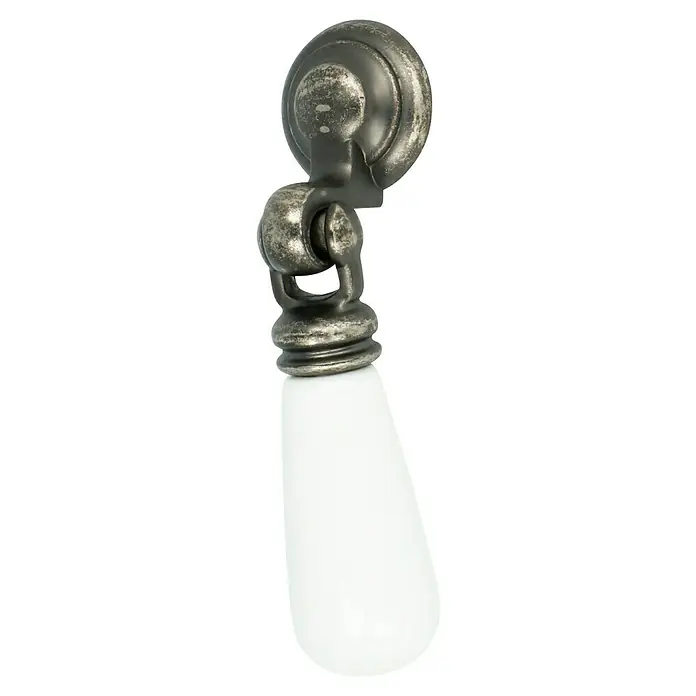 Häfele Tirador para muebles - Porcelana, Blanco - Primer plano de un tirador de cajón metálico con un mango de porcelana blanca. Un complemento elegante y con estilo para muebles.