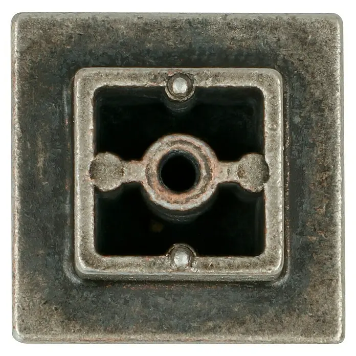Häfele Pomo para muebles - Tipo de tirador del mueble: Botón, Niquelado, Gris - Primer plano de una base de pomo de mueble cuadrada de metal con un agujero central y un aspecto vintage.