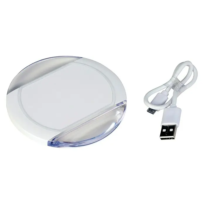 Ladegerät - USB-Ladebuchse 5 V/2 A, Ausgangsspannung: 5 V - Kabelloses Ladegerät mit transparentem Rand und weißem Zentrum neben einem USB-Kabel.