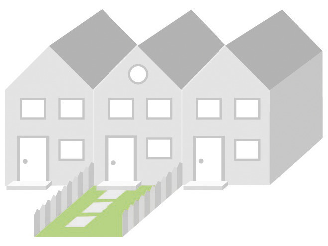 Häuserreihe mit kleiner Rasenfläche zur Deko