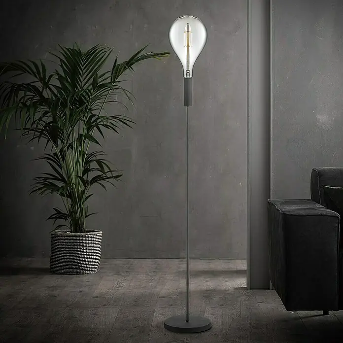 LED-Lampe Vintage Globe-Form E27 - E27, Dimmbar, Neutralweiß, 400 lm, 4 W - Elegante Stehlampe mit einer großen, dekorativen Glühbirne in einem stilvollen Wohnzimmer. Perfekt als modernes Lichtelement.