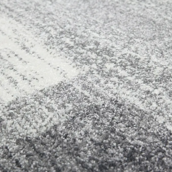 Kurzflorteppich Feeling 500 - Silber, 290 x 200 cm, 100 % Polypropylen (Flor) - Nahaufnahme eines Teppichs mit modernem Muster in Grau- und Weißtönen, ideal für ein stilvolles Zuhause.
