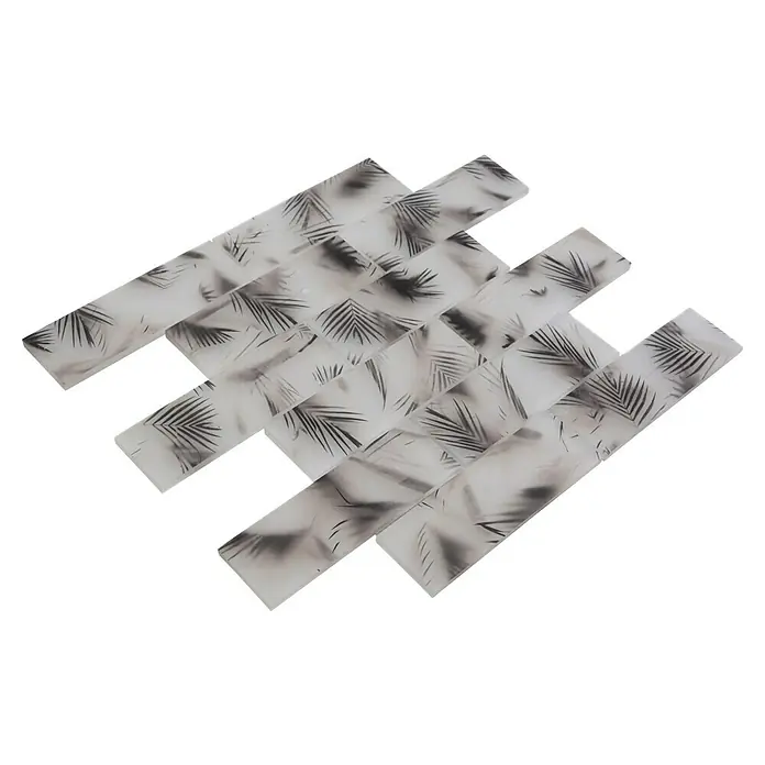 Mosaikfliese Rechteck Crystal XCM HL25 - 29,8 x 29,8 cm, Schwarz, Matt - Nahaufnahme eines Mosaiks mit Blattmuster auf länglichen Steinen, ideal für moderne Innenräume.