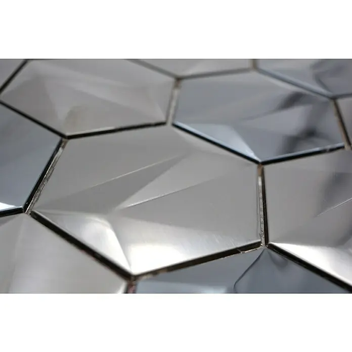Mosaikfliese Hexagon HXM 60PL - 26,2 x 23 cm, Tungsten Stahl, Glänzend - Nahaufnahme von stilvollen, silbernen 3D-Hexagon-Fliesen, die ein modernes und elegantes Design für Innenräume bieten.