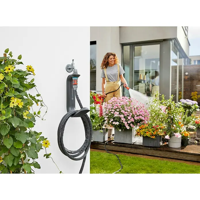 Gardena Gartenschlauch Liano Life - 10 m, Schlauchdurchmesser: 13 mm - Ein Gardena Wand-Schlauchhalter mit Schlauch und Wasserhahn an einer weißen Wand, neben einer Frau, die Blumen gießt.