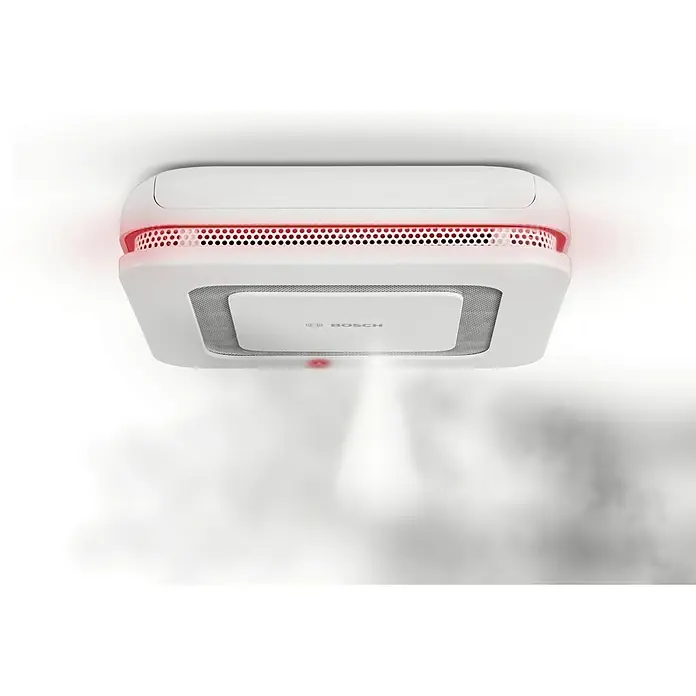 Bosch Smart Home Rauchwarnmelder Twinguard - Batterielaufzeit: 2 Jahre, 41 x 138 x 138 mm - Das Bild zeigt einen weißen Bosch Smart Home Rauchmelder mit roter Beleuchtung, der an einer Decke montiert ist und Rauch detektiert.