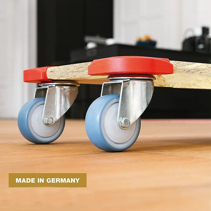 Wagner System Transportroller MM1322 - L x B x H: 590 x 290 x 110 mm, Traglast: 300 kg, Holz - Möbelroller mit blauen Rädern und roter Einfassung. Die Möbelroller sind aus hochwertigen Materialien gefertigt und in Deutschland hergestellt.