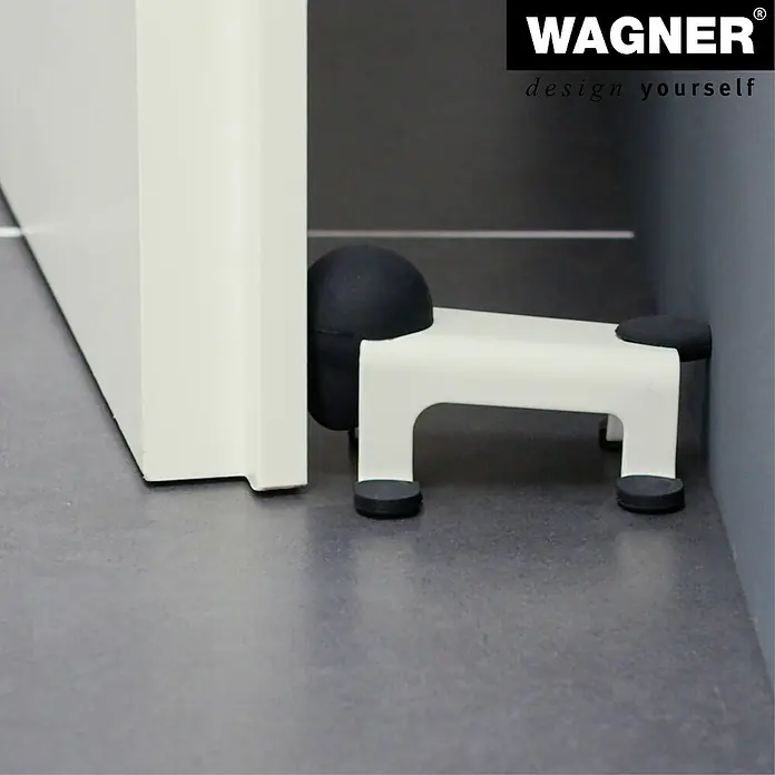 Wagner System Bodentürstopper EH5205 - L x B x H: 59 x 106 x 71 mm, Stahl, Weiß - Der Türstopper in Hundeform von Wagner hält Türen stilvoll offen. Er ist weiß mit schwarzen Akzenten und schützt Wände und Türen.
