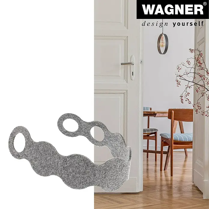 Wagner System Türkeil - L x B x H: 7,5 x 410 x 50 mm, Textil, Grau - Produktbild: Ein grauer Türstopper aus Filz in Wellenform mit runden Aussparungen, der eine geöffnete Tür im Hintergrund hält.