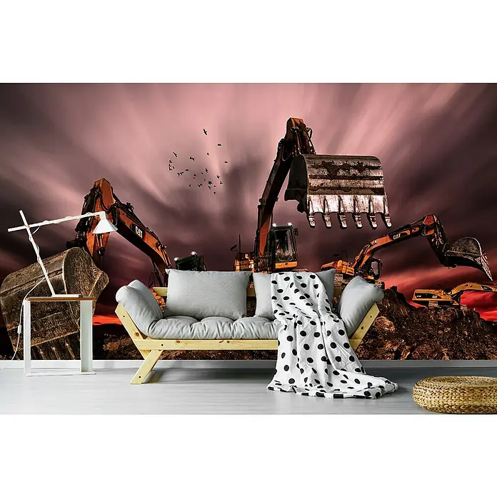 Papermoon Premium collection Fototapete Bagger Invasion - B x H: 450 x 280 cm, Vlies - Eine stilvolle Couch mit Kissen und einer Decke mit Punkten vor einer Fototapete mit Bauarbeitern. Die Couch lädt zum Verweilen ein.