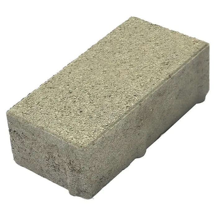 EHL Pflasterstein Rechteckpflaster - Grau, 20 x 10 x 6 cm, Rechteckig - Nahaufnahme eines grauen Pflastersteins mit unebener Oberfläche vor schwarzem Hintergrund.