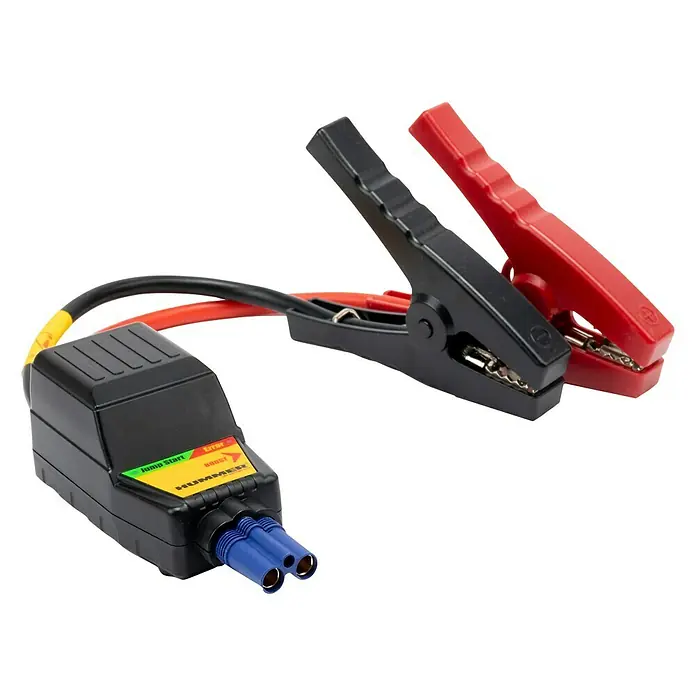Kit de arranque HUMMHX - 12 V, 3 Ah - Imagen de un arrancador Hummer, con pinzas y cables. El dispositivo tiene indicadores verdes, rojos y amarillos para el estado operativo.
