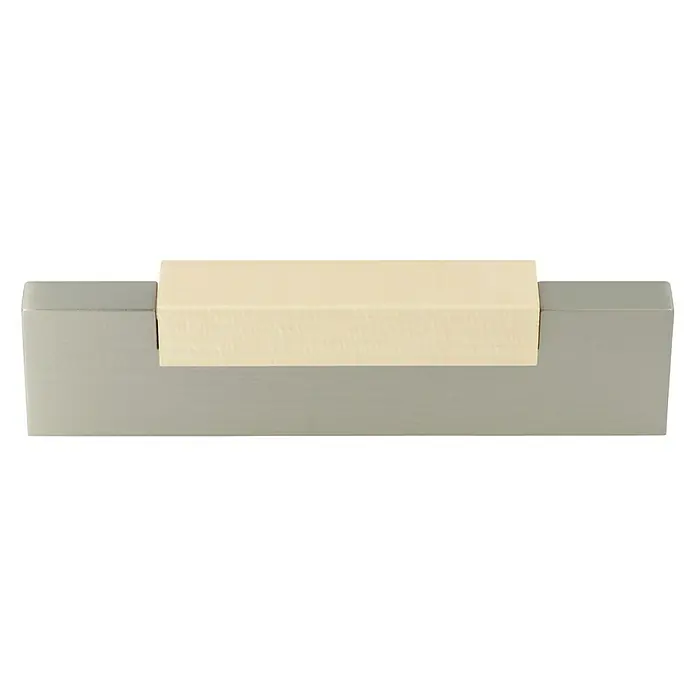 Möbelgriff - Typ Möbelgriff: Sonstige, L x B x H: 95 x 26 x 12 mm, Holz, Verchromt - Nahaufnahme eines schlichten grauen Briefbeschwerers mit einem cremefarbenen Papieretikett, ideal für Büro und Schreibtisch.
