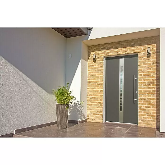 Splendoor Haustür Thermodoor PLUS SP20 - 110 x 210 cm, DIN Anschlag: Rechts, Anthrazitgrau Feinstruktur - Moderne graue Eingangstür mit vertikalem hellem Streifen und langem silbernen Griff in einem zeitgenössischen Zuhause.