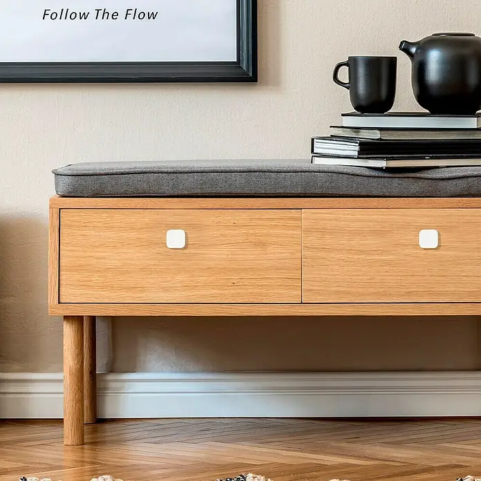 Häfele Pomo para muebles - Porcelana - Un elegante aparador bajo de madera clara con dos cajones y tiradores cuadrados, ideal para espacios modernos.\n