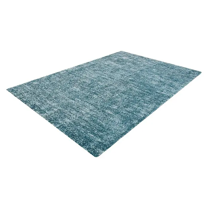 Kayoom Kurzflorteppich Etna - Petrol, 150 x 80 cm, 100 % Mikropolyester - Ein rechteckiger Teppich in Blaugrün- und Weißtönen, der eine subtile Textur und ein elegantes Aussehen für jeden Raum bietet.