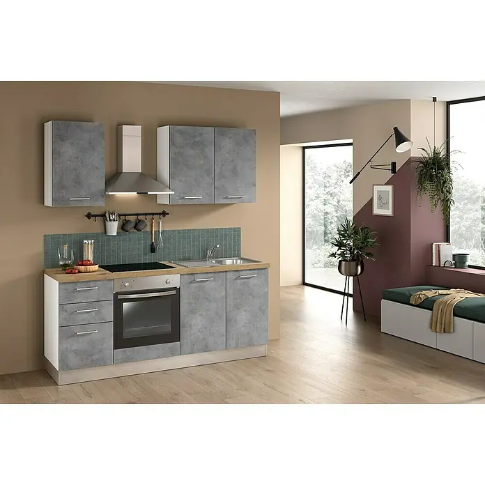 Marinelli Cucine Vormontierte Küchenzeile Cassiopea - Breite: 195 cm, Hellgrau, Mit Elektrogeräten - Ein Küchenbereich mit grauen Beton-Küchenschränken, einer Arbeitsplatte in Holzoptik und Geräten aus rostfreiem Stahl für einen modernen Look.