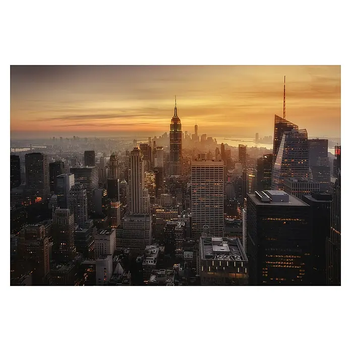 Papermoon Premium collection Fototapete Manhattans Licht - B x H: 400 x 260 cm, Vlies - Die Skyline von New York City erstrahlt im goldenen Licht der Morgendämmerung mit dem imposanten Empire State Building im Zentrum.