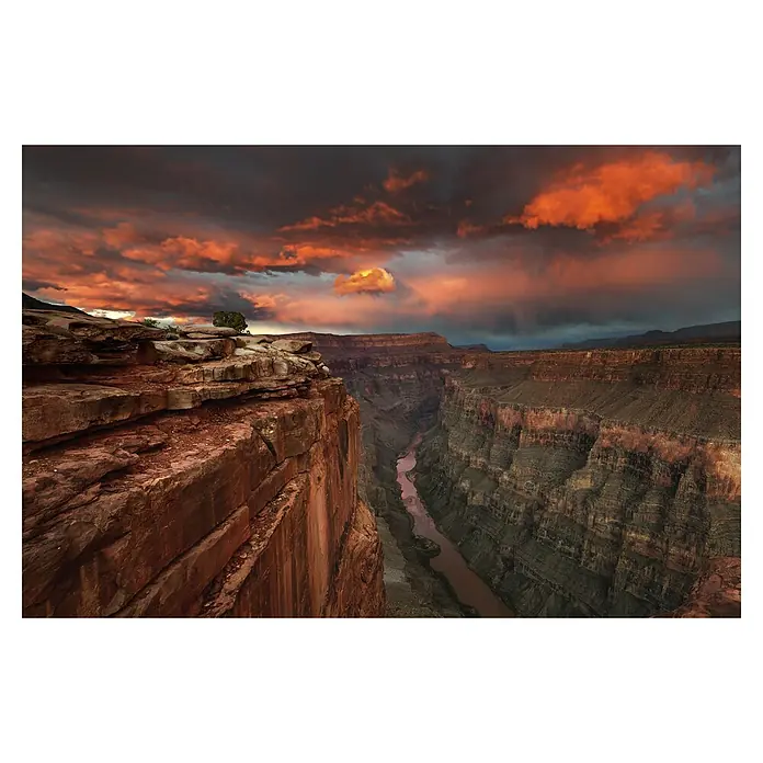 Papermoon Premium collection Fototapete Schluchtausblick - B x H: 250 x 186 cm, Vlies - Grand Canyon mit dramatischem Himmel: Farbenprächtige Schluchtlandschaft im Abendrot, ein unvergessliches Naturschauspiel.