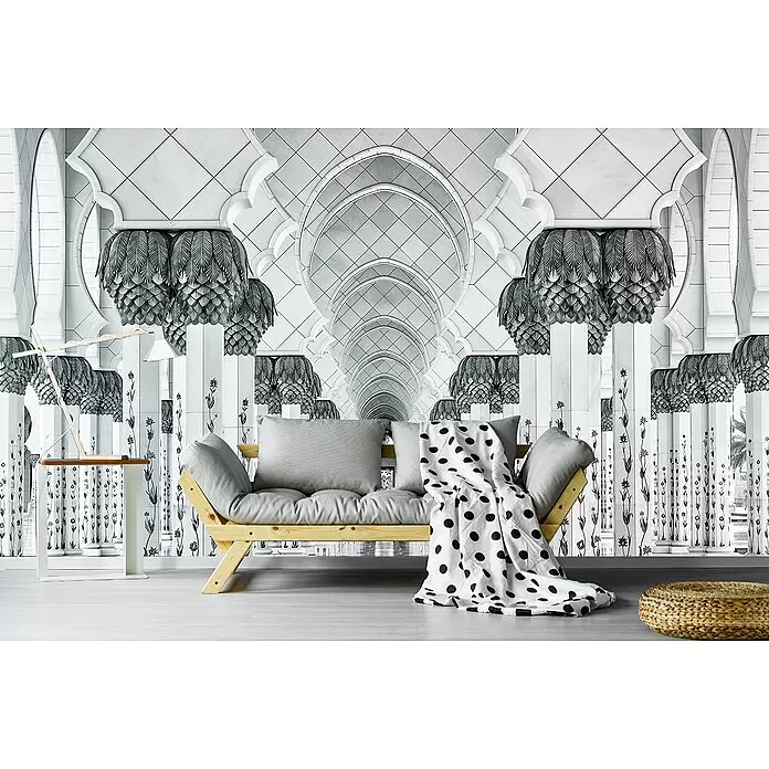 Papermoon Premium collection Fototapete Art der Symmetrie - B x H: 300 x 223 cm, Vlies - Ein helles Holzsofa mit grauen Kissen, gepunkteter Decke, weißem Beistelltisch mit Lampe und geflochtenem Pouf, schafft einen gemütlichen Wohnbereich.