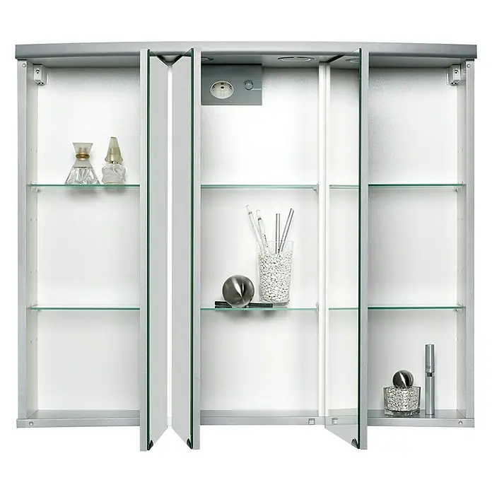 Sieper LED-Spiegelschrank Ancona - B x H: 82,5 x 69,1 cm, Holz, Silber - Ein Badezimmerschrank mit Spiegeltüren und Glasböden, beleuchtet und mit verschiedenen Badartikeln dekoriert.