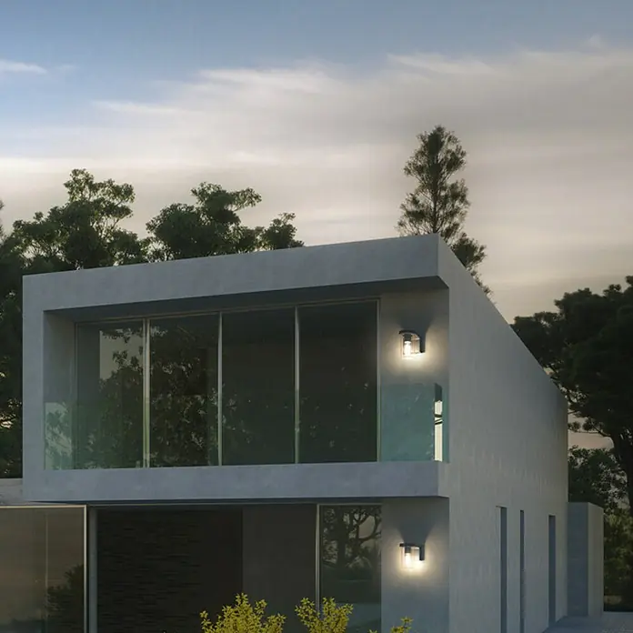 Osram Außenwandleuchte Endura Cascade Wall - 16 x 12 x 18 cm, Dunkelgrau, IP44 - Moderne Außenleuchten an einer Hausfassade, die ein warmes Licht ausstrahlen und die Architektur hervorheben.\n
