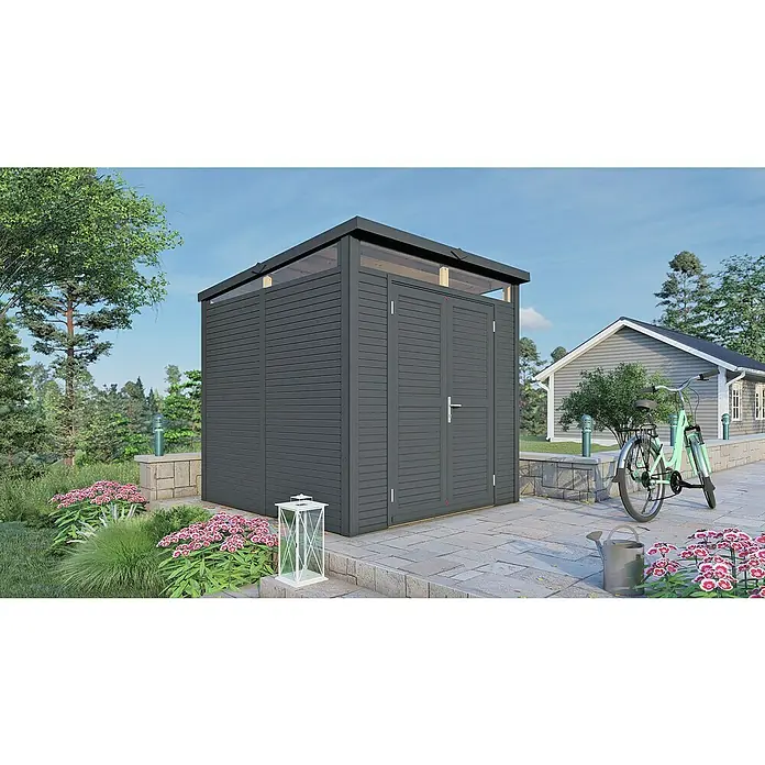 Bertilo Gerätehaus Woodline - Außenmaß inkl. Dachüberstand (B x T): 226 x 240 cm, Holz, Anthrazitgrau - Eine moderne, graue Gartensauna mit Doppeltür fügt sich nahtlos in den Garten ein, umgeben von Blumen und einem kleinen Haus im Hintergrund.
