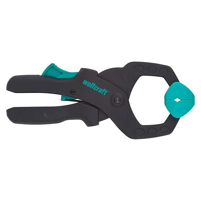 Wolfcraft Abrazadera de trinquete 1 FZR 40 - Anchura de sujeción: 40 mm - Sargento de una mano Wolfcraft con mango negro y detalles turquesa, ideal para fijar piezas de forma rápida y segura.