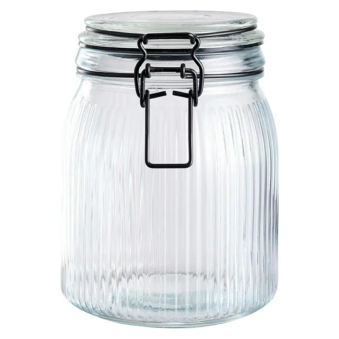Frasco con cierre mecánico - 900 ml, Vidrio - Tarro de vidrio con cierre hermético, ideal para almacenar alimentos y otros objetos. El diseño acanalado le da un toque elegante.