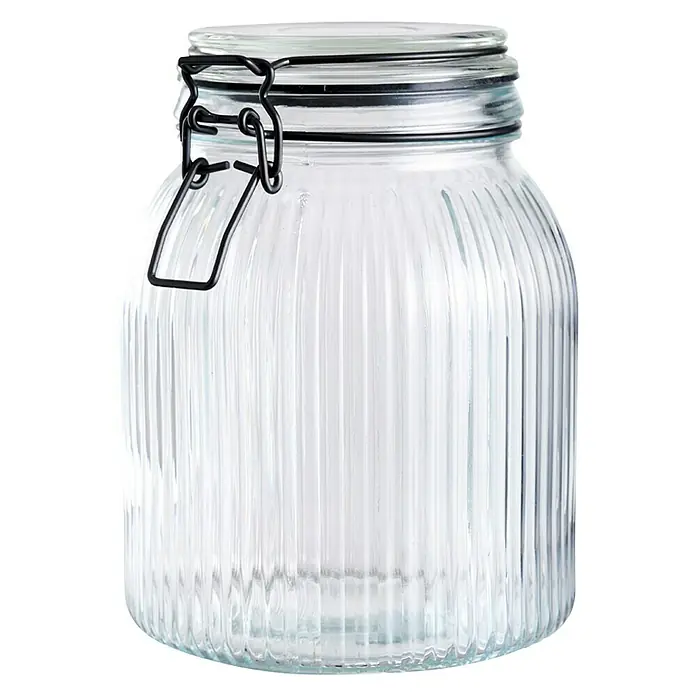 Frasco con cierre mecánico - 1,4 l, Vidrio - Tarro de vidrio con diseño acanalado y cierre negro. Perfecto para almacenar alimentos o como elemento decorativo en la cocina.