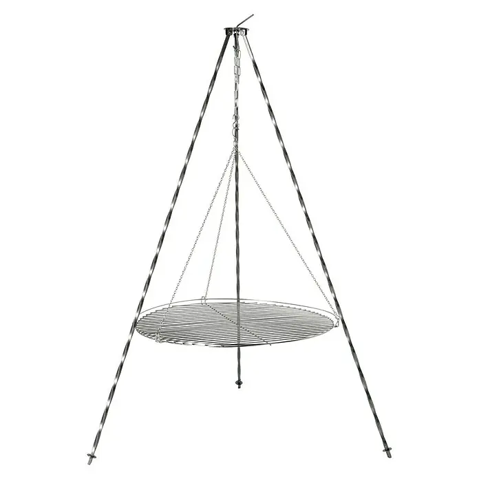 Buschbeck Schwenkgrill - Passend für: Buschbeck Feuerschale Ø 80 - 100 cm - Ein beleuchteter, silberner Grill mit drei Beinen und einer runden Grillfläche, ideal für Outdoor-Kochabenteuer.