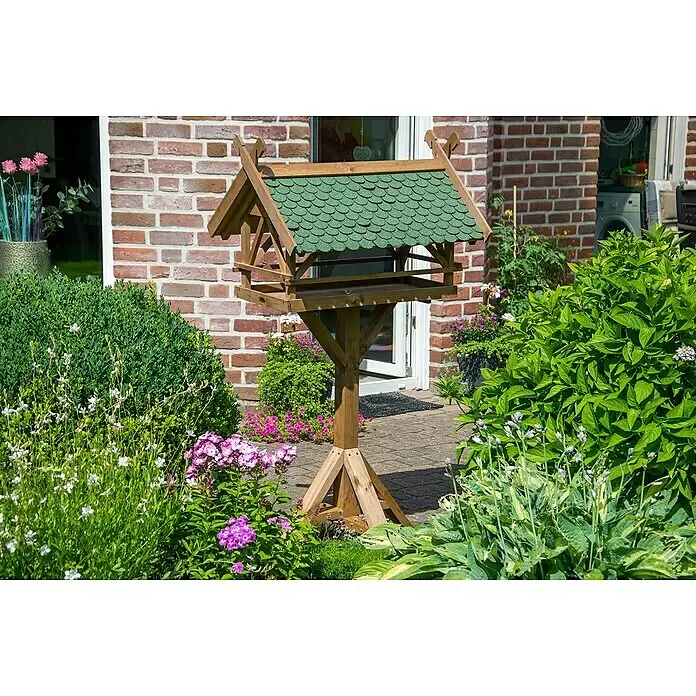 Dobar Vogelfutterhaus Westfalen - 78 x 62 x 148 cm, Grün/Braun, Holz - Hölzernes Vogelhaus mit grünem Schindeldach, im Garten stehend.