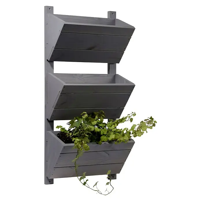 Dobar Hochbeet - L x B x H: 38 x 17,5 x 79 cm, Holz, Grau - Wandmontierter vertikaler Pflanzer aus Holz mit drei Fächern, wobei das untere Fach mit grünen Pflanzen bepflanzt ist.