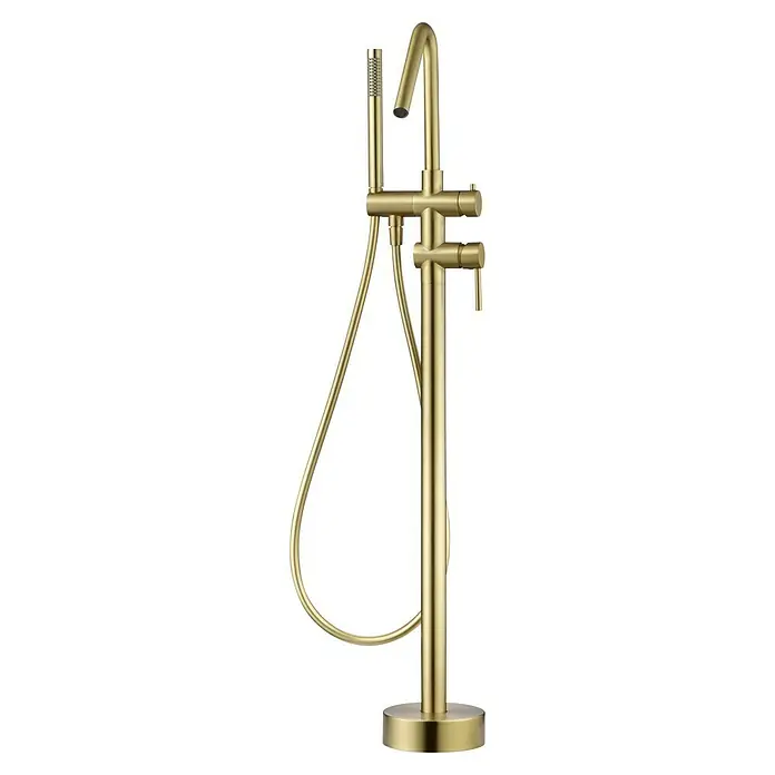 Camargue Natur Grifo para bañera - Oro - Primer plano de un grifo dorado de bañera exento con ducha de mano. El diseño es moderno y elegante, perfecto para baños de lujo.