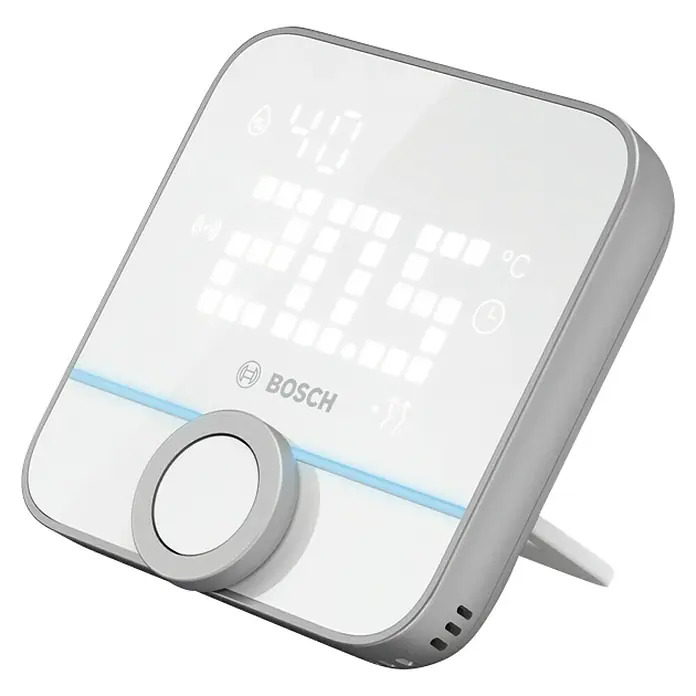 Bosch Smart Home Raumthermostat II - Weiß, Silber, L x B x H: 87 x 86 x 35 mm - Nahaufnahme eines Bosch Smart Home Thermostats mit digitaler Anzeige und Bedienelementen.
