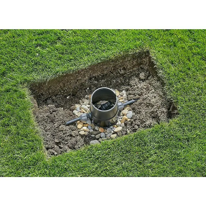 Gardena Sprinklersystem Druckminderer - 1″ - Versenkregner im Garten installiert. Eine moderne Bewässerungslösung für den Rasen mit einfacher Installation und effizienter Wasserverteilung.