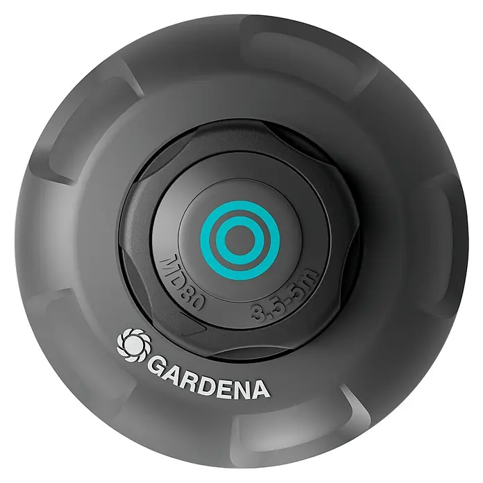 Gardena Sprinklersystem Turbinenversenkregner MD 80 - Max. Regnerfläche: 80 m², Rasenbewässerung - Gardena MD80 Versenkregner im Detail, mit Fokus auf das Einstellungsrad und das Gardena-Logo. Ideal für präzise Rasenbewässerung.