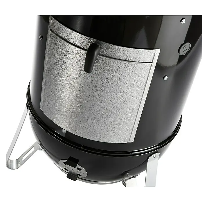 Weber Räucherofen Smokey Mountain Cooker - Durchmesser Grillfläche: 47 cm, Schwarz - Nahaufnahme eines schwarzen Grills mit einer silbernen Klappe, ideal zum Räuchern und Grillen im Freien.