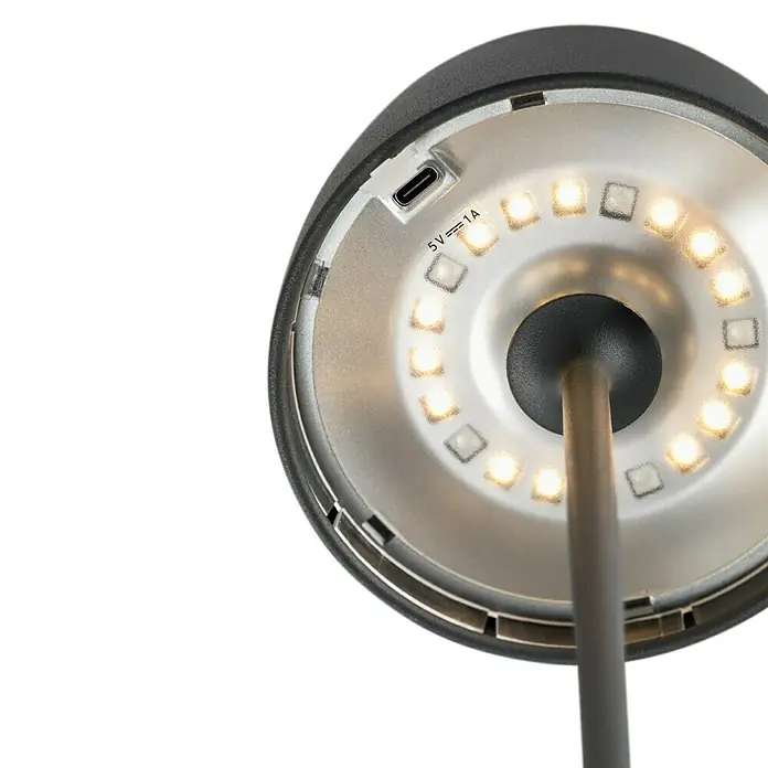 Lavida Akku-Tischleuchte Silea - 3,3 W, Anthrazit, Lichtfarbe: RGBW - Nahaufnahme einer Lampe mit LED-Ring und USB-C-Anschluss, die ein modernes Design und funktionale Beleuchtung vereint.