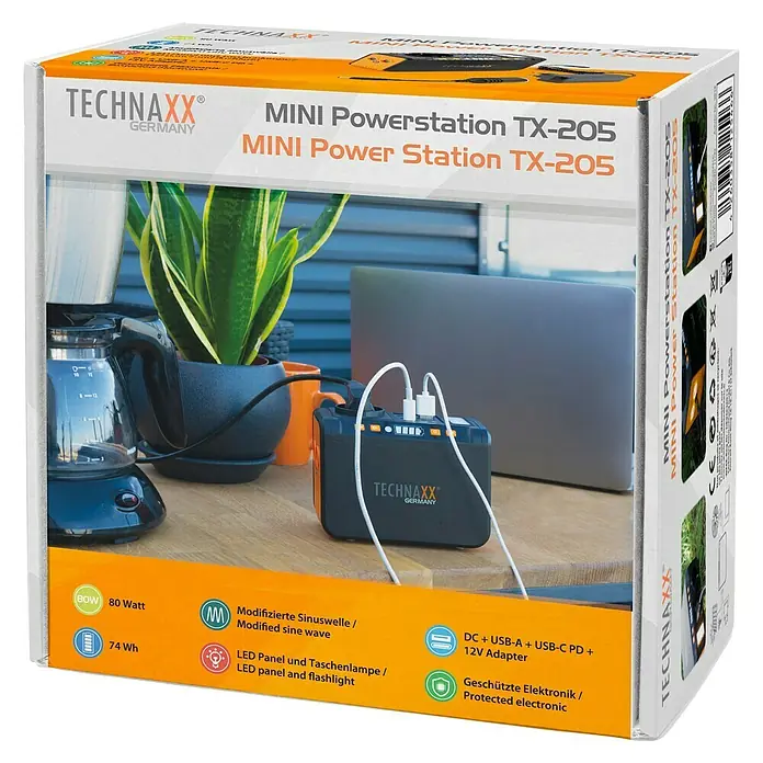 Technaxx Powerstation TX-205 - 74 Wh, Schwarz/Orange - Abbildung der Technaxx Mini Powerstation TX-205 mit Zubehör, verpackt in einem bedruckten Karton.