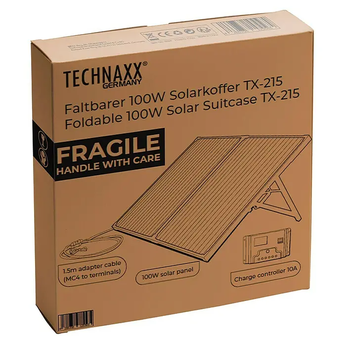 Technaxx Solarkoffer TX-215 - Max. Leistung: 100 W, 107 x 57 x 4 cm - Abbildung einer Technaxx faltbaren 100W Solar-Koffer TX-215 Verpackung mit Zubehör wie Adapterkabel und Laderegler.
