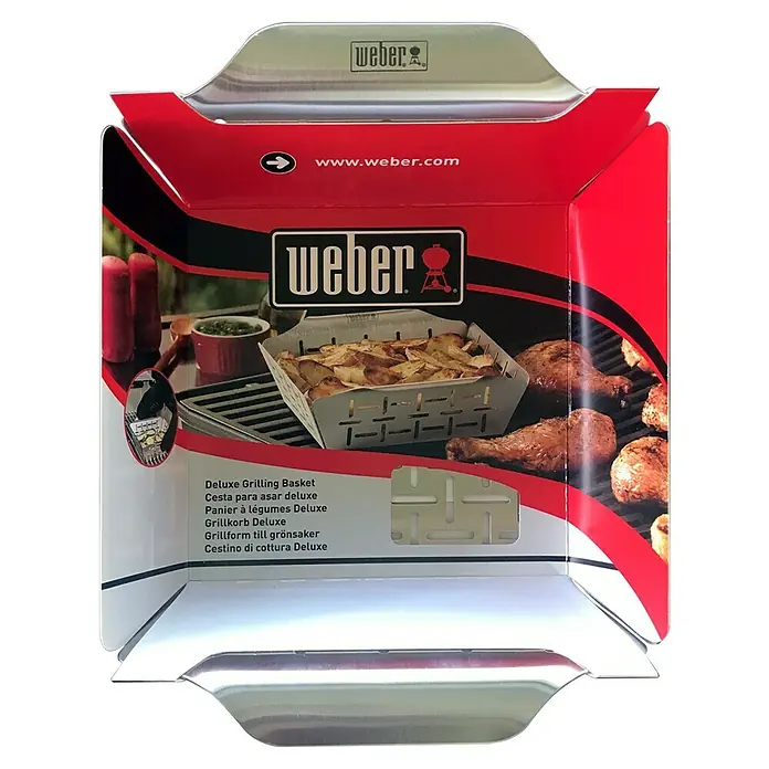 Weber Style Gemüsekorb - Edelstahl, 29,5 x 35 cm - Verpackung für den Weber Deluxe Grillkorb mit Bildern von gegrilltem Essen.