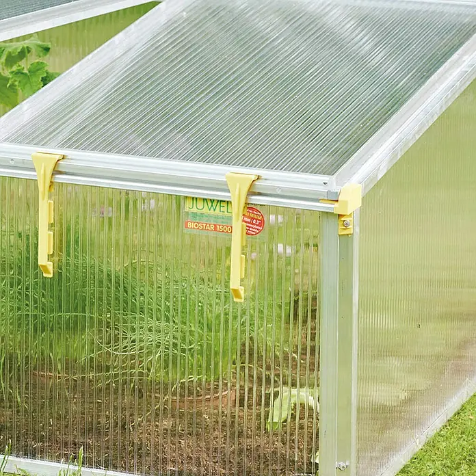 Juwel Frühbeet Premium-BIOSTAR 1500 - 150 x 80 x 50 cm, Polycarbonat, Transparent/Gelb - Nahaufnahme eines Juwel Biostar 1500 Frühbeetkasten, der Pflanzen schützt und das Wachstum fördert.